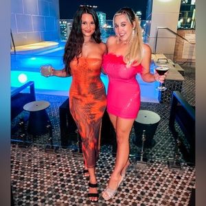 Pink strapless sequin dress with feather